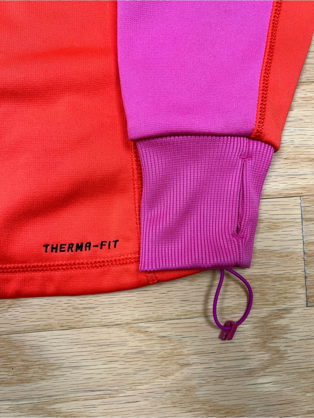 Nike Women’s Therma-FIT Colorblock Pullover Hoodie in Bright Orange & Purple - Picture 7 of 11